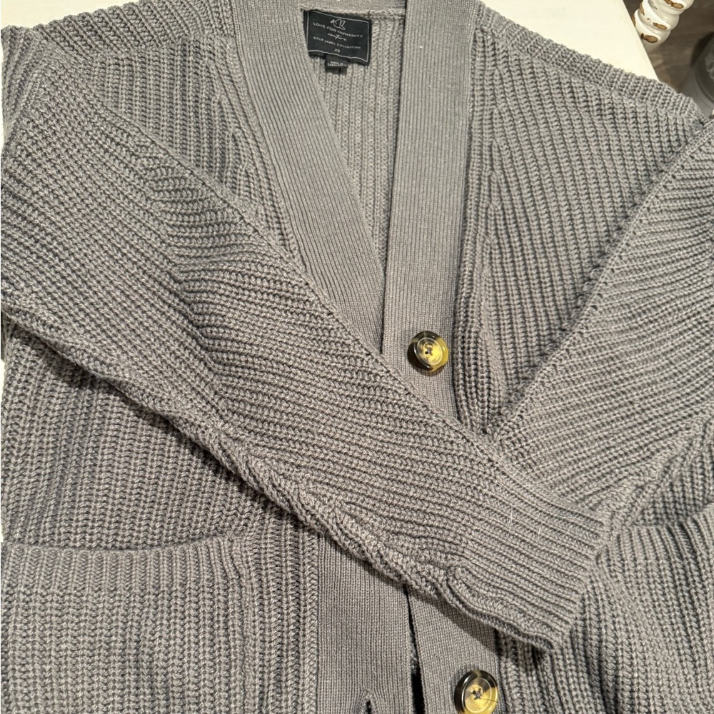 Women’s extra small cardigan fits like a small